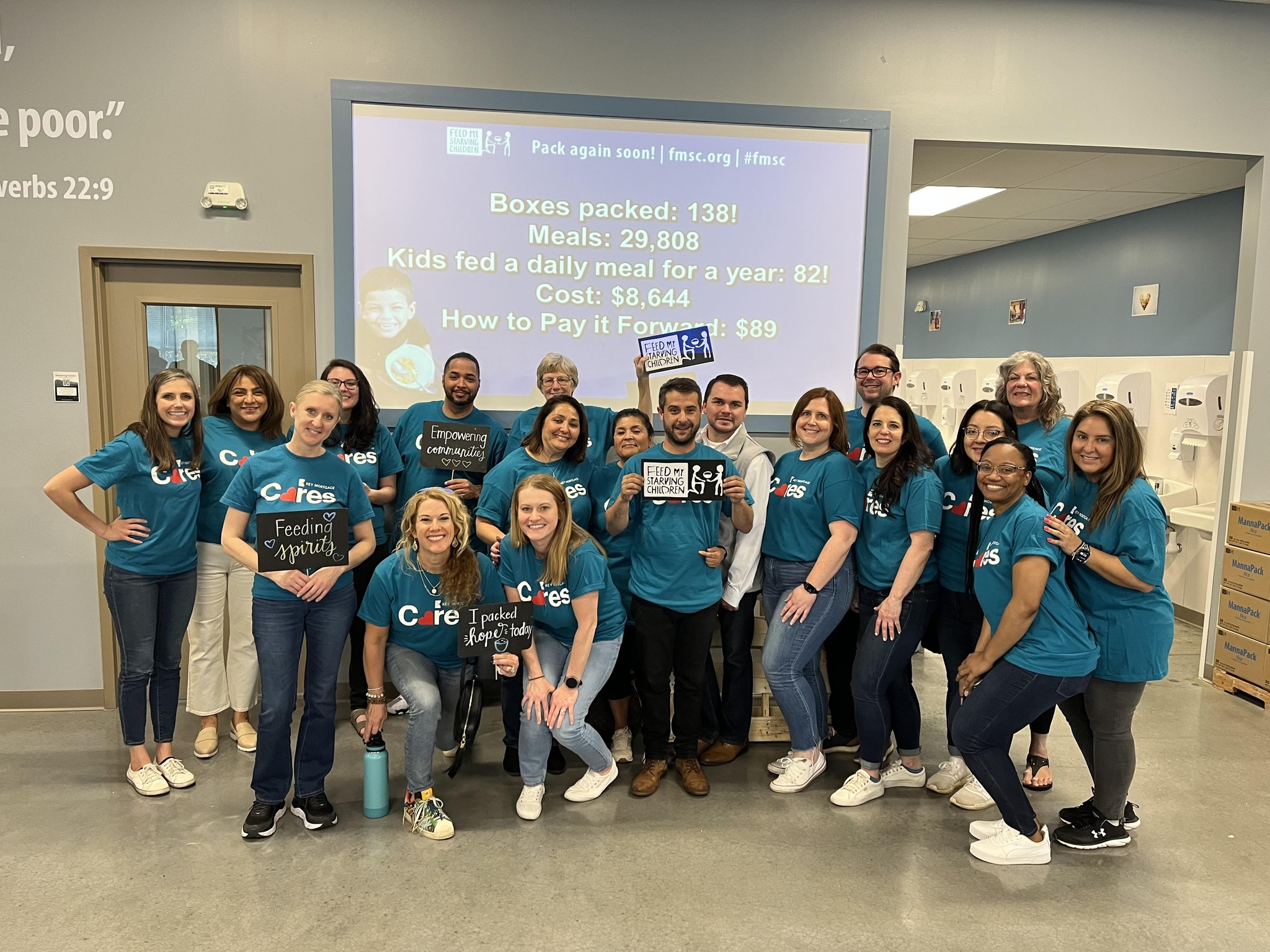 Group pose for the hardwork at Feed My Starving Children in Schaumburg